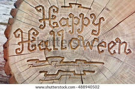 Happy Halloween. Carving wood for decoration of your home. Greeting card.