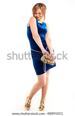 A girl in a dress with a handbag