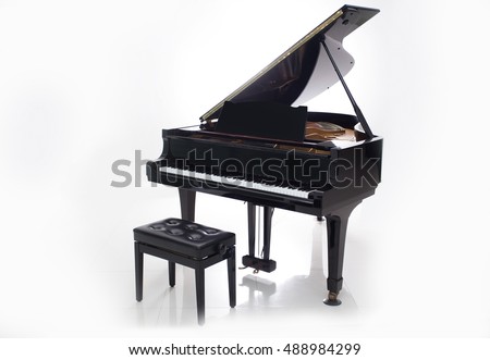 Grand piano on a white background.