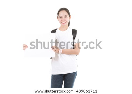 Young Asian showing blank empty billboard poster sign. Isolated on white background.