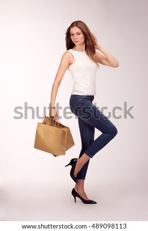 Picture of lovely woman with biodegradable shopping bag.