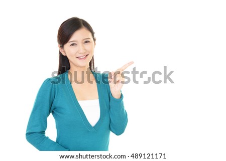 Asian woman pointing