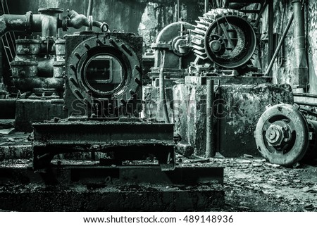 Rusty equipment of abandoned ex Soviet fuel factory.