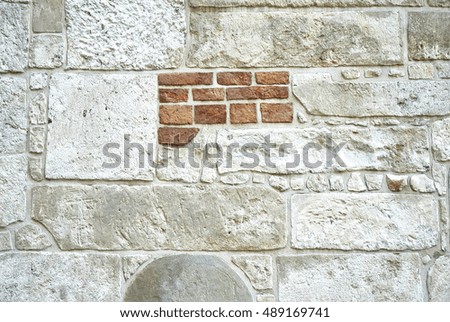grunge brick and stone wall - irregular pattern