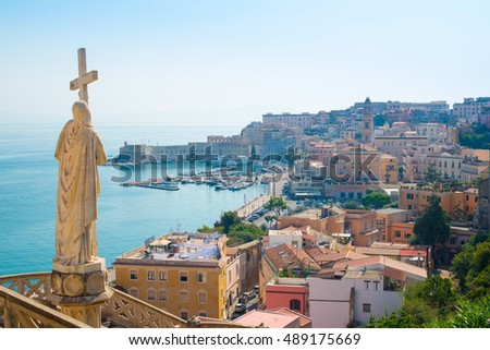Statue of St. Francesco in Gaeta, Italy. panorama of the city in Italy by the sea. ships at sea. monuments and churches with architecture. blue sea