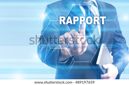Businessman is pressing on the virtual screen and selecting "Rapport".