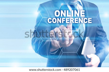 Businessman is pressing on the virtual screen and selecting "Online conference".