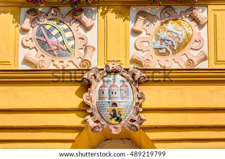 Historic emblem at a building in the old town of Freiber in Saxony, Germany