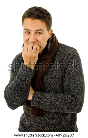 studio picture of a young man dressed for winter with cold