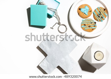 Simple flat lay desktop objects in white marble and aqua