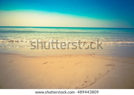 Vintage tropical beach and sea for holiday vacation.Sea bottom summer wave background. Exotic sea water nature. Nature tropical water paradise. nature vacation.Tranquility of ocean nature vacation.