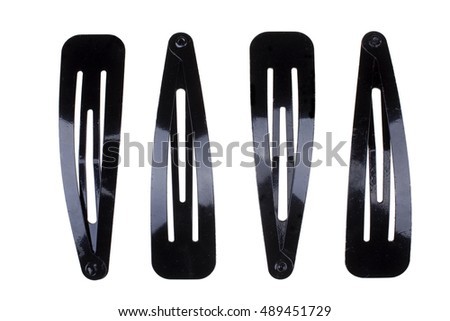 Black metal hair-slides isolated on white background with clipping path Royalty-Free Stock Photo #489451729