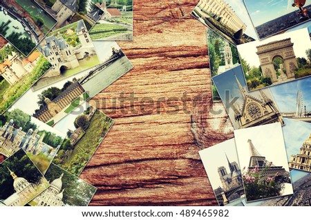 Travel concept. Old photos on wooden background.