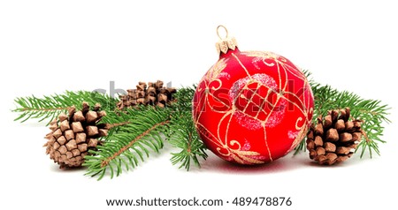 Christmas decoration ball with fir cones and fir branches isolated on a white background 