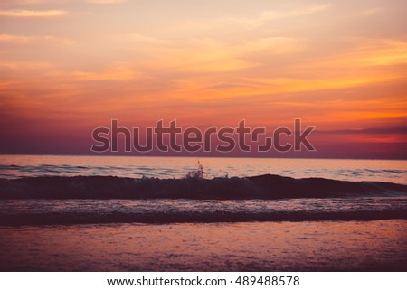 Nature background: Twilight sky after evening sunset and landscape seaside for family vacation concept - Vintage Filter.