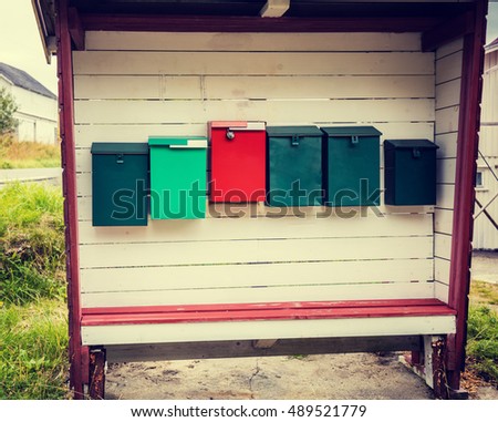Post boxes on white wooden background on the street