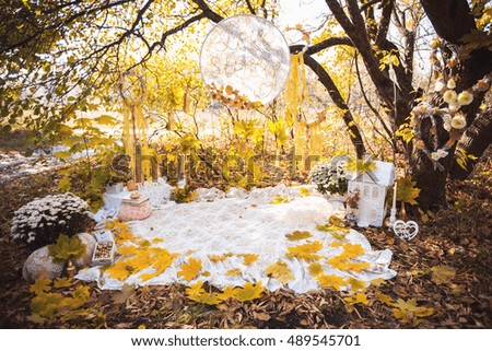 Autumn decorations. Fall leaves and golden decor
