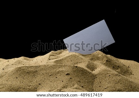 card in the sand