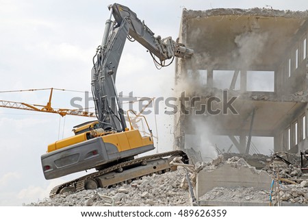 An old building being torn down; the entire building was gone a few hours later. Royalty-Free Stock Photo #489626359