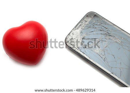 Smartphone with broken screen with red heart isolated on white background