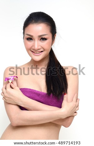Healthy woman with flower isolated on white background