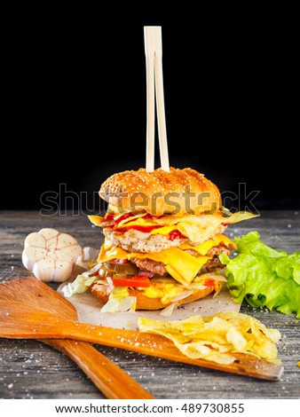 A delicious burger on a wooden table