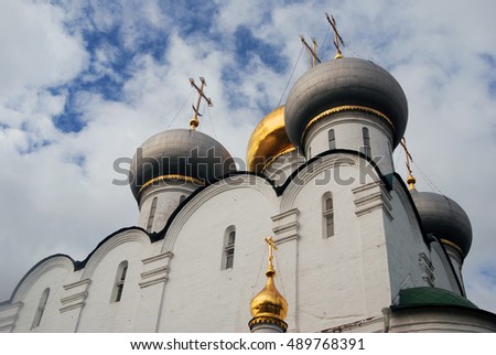 Smolensk Icon church. Architecture of Novodevichy convent in Moscow. Popular touristic lanmdark. UNESCO World Heritage Site. Color photo.