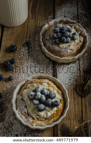 Simple rustic cheesecake with berries, place for your advertising, grandma style picture