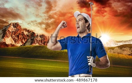 Golf Player in a blue shirt celebrating, on a golf course.