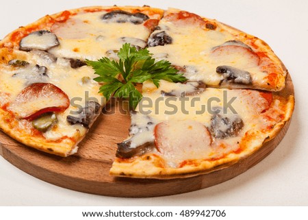 pizza on a wooden cutting board