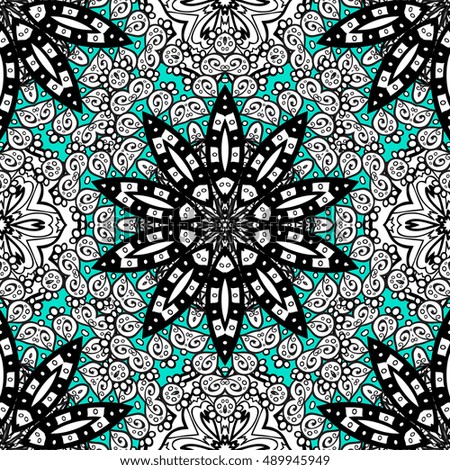 Oriental seamless pattern of white flowers and mandalas. Vector blue background.