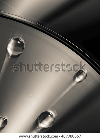 Abstract photo of a CD and drops