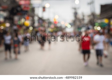 People in bokeh, Blurred crowd of people in Bang La Road during night life, Phuket, Thailand