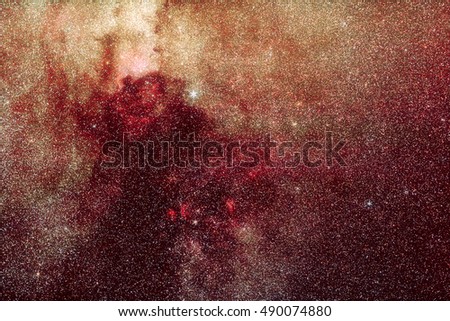 Universe astronomy photo: Milky Way in Cygnus constellation with lot of stars and red hydrogen nebulae which form a specific pattern. 59 minutes of total exposure. 
