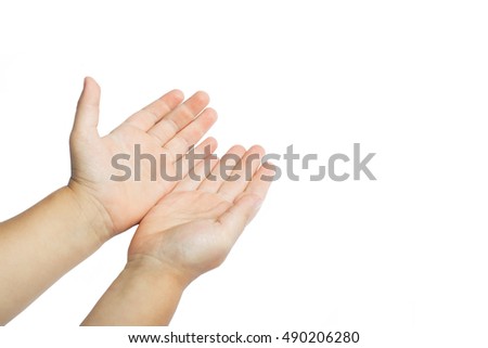 disclosed children's hands pointing at the place for the text (picture) isolated on white background