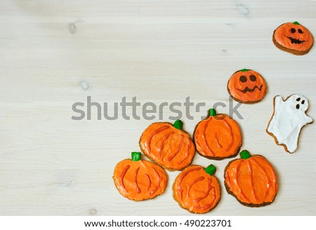 Funny delicious ginger homemade biscuits for Halloween on the table. horizontal view from above. Halloween cookies