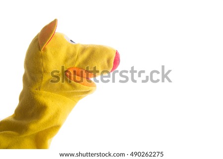 Hand wearing giraffe puppet 