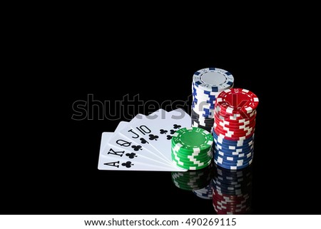 Playing cards and colorful chips to play poker