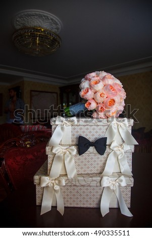 Beautiful bridal bouquet on the boxes