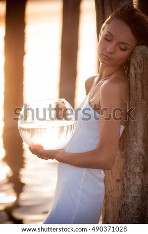 beautiful woman rests at sea in summer time