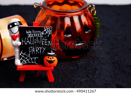 Happy halloween day concept and black background design, close up and selective focus.