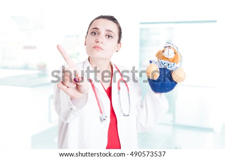 Medical pediatric woman doing refusal or forbidden gesture as wrong child treatment concept