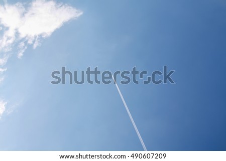 Sky & plane in blue sky. Aircraft flying in sky