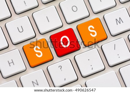 SOS on keyboard Royalty-Free Stock Photo #490626547