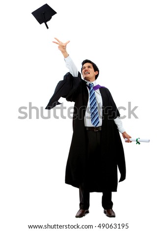 Happy graduation man throwing his mortarboard isolated over a white background