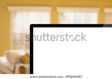 laptop is not full screen  on blurred hallway background