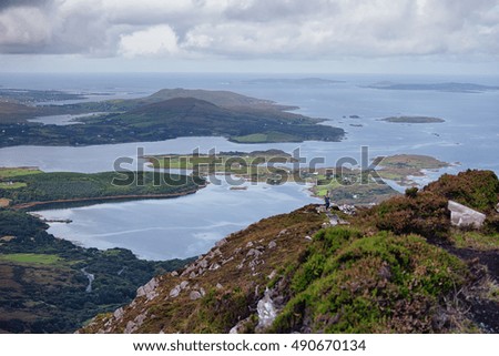 A view of islands and green landscape from on top of the mountain
