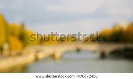 Blurred photo of Seine river at autumn. Paris (France)