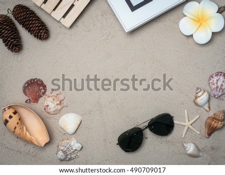 TOP VIEW SAND BACKGROUND WITH  SHELL ,STARFISH,SUMMER TIME TRAVEL CONCEPT