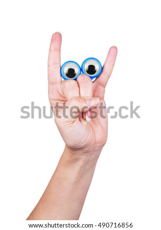 eyes on the fingers of the hand, on a white background